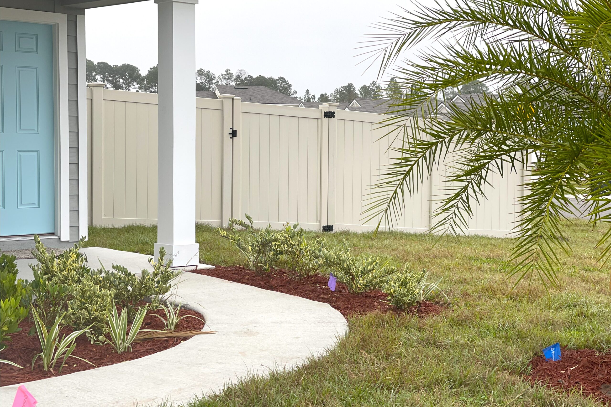 tan vinyl fence